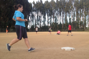 A rhino supporter runs to first base while another slides to second!